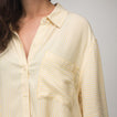Ellie Button Up showing left shoulder and chest pocket, yellow striped beach-inspired comfortable women's apparel.