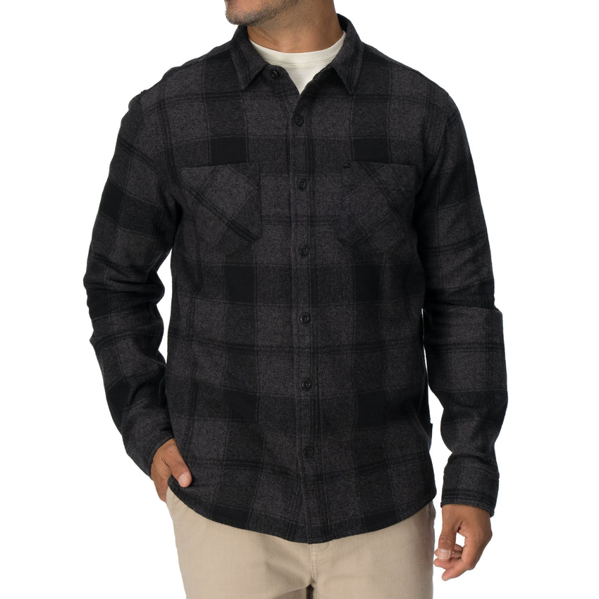 Man wearing a black and gray Reggie Flannel Shirt front view, showcasing soft brushed cotton fabric from StoreRank.ai All Products.