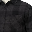 Close-up of the chest pocket and buttons on the Reggie Flannel Shirt in dark gray plaid from StoreRank.ai All Products.