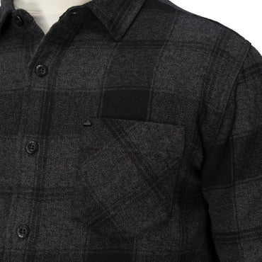 Close-up of the chest pocket and buttons on the Reggie Flannel Shirt in dark gray plaid from StoreRank.ai All Products.