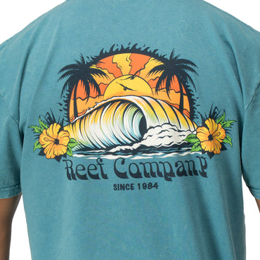 Back view of Kyle Short Sleeve Tee in sun-faded blue with vintage surf wave and palm tree graphic for beach comfort.