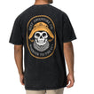 Back view of a man wearing a black Salty Short Sleeve Tee featuring vintage skull and hat artwork, coastal style apparel.