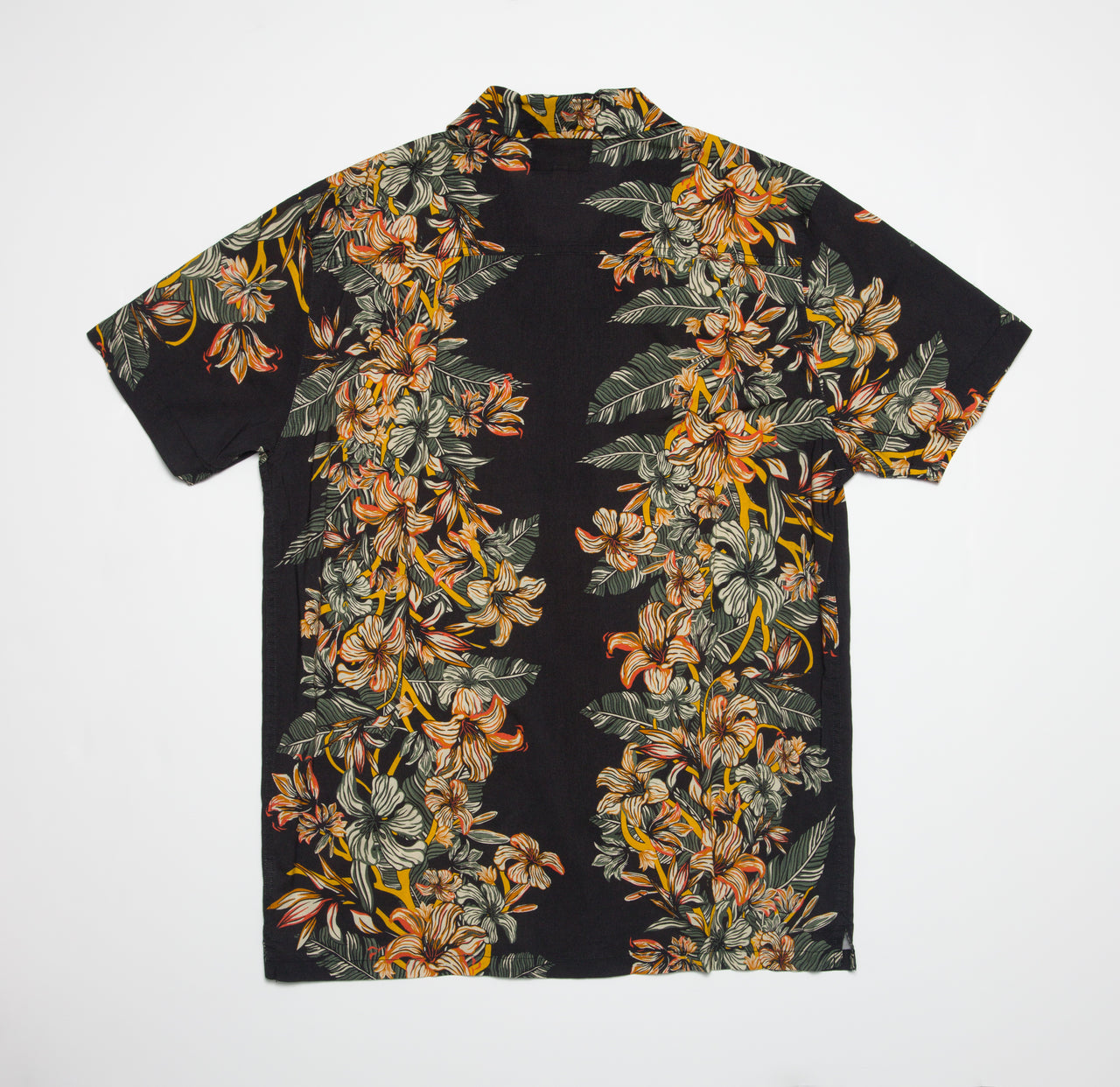 Drift Ss Camp Shirt flat lay showing black fabric with orange and yellow floral print, surf-inspired casual beach apparel.