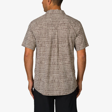 Man wearing a Ferris Classic Shirt in brown pattern, shown from the back, casual beach-inspired men's apparel.