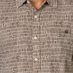 Ferris Classic Shirt close-up showing textured brown pattern, button front, chest pocket, and collar for men’s beach apparel.