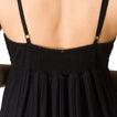 Back view close-up of Yuni Maxi Dress showing lightweight textured cotton fabric and delicate adjustable straps.