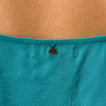 Close-up of the back upper section of the teal Ollie Tank showing fabric texture and a small brand logo.