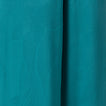 Ollie Tank close-up of teal fabric texture with subtle surf-inspired pattern, designed for comfort and beach lifestyle.