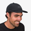 Man wearing a black Schotts Twill Hat facing right, showcasing the front and side with REEF logo on the crown.