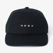 Front view of black Schotts Twill Hat with white REEF logo, featuring lightweight, durable, and comfortable beach-inspired design.