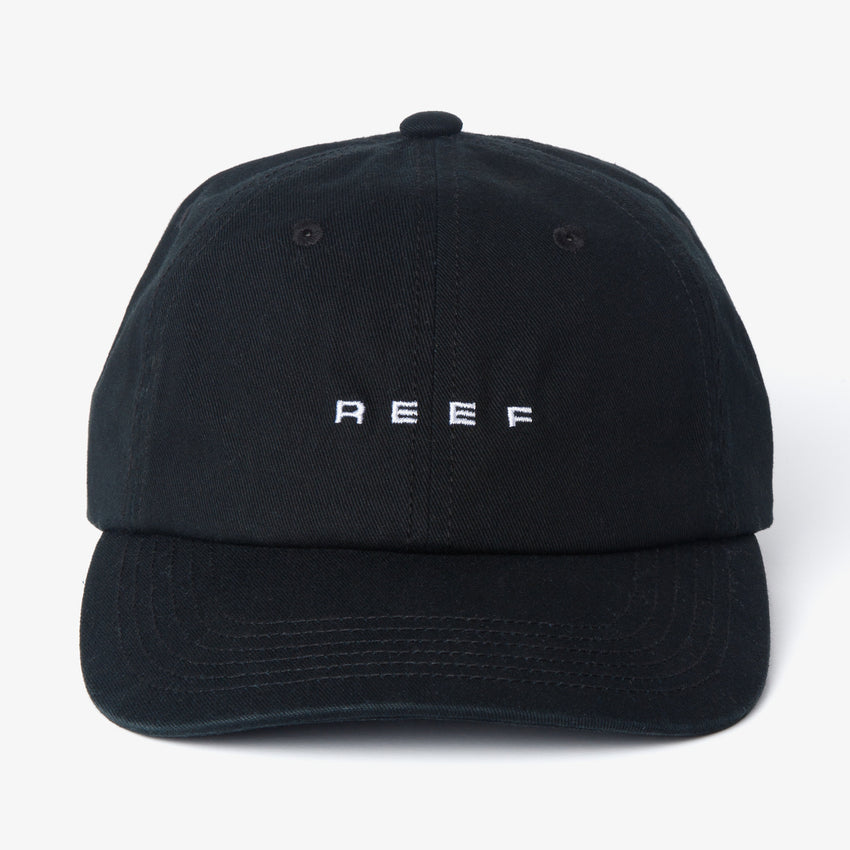 Front view of black Schotts Twill Hat with white REEF logo, featuring lightweight, durable, and comfortable beach-inspired design.