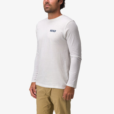 Male model wearing a white Wellie 24 Long Sleeve Tee facing forward, showcasing lightweight, beach-inspired comfort apparel.