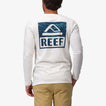 Back view of a man wearing the Wellie 24 Long Sleeve Tee in white with a blue REEF logo, showcasing beach-inspired comfort.