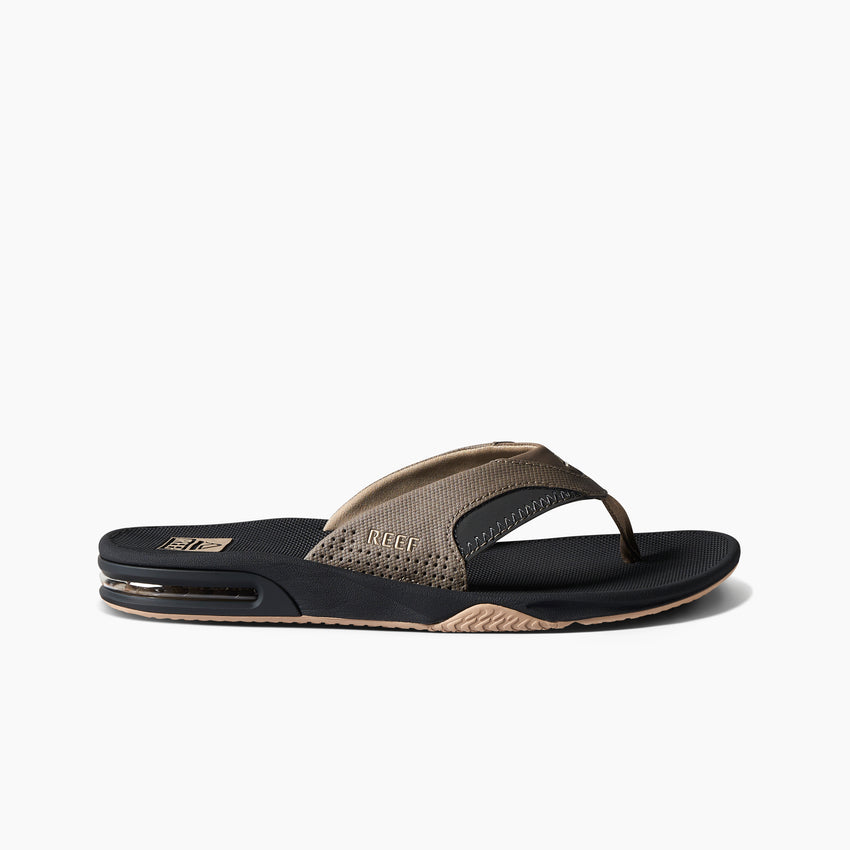 Side view of Fanning men's flip flop sandal in fossil and raven, featuring anatomical arch support and soft cushioning.