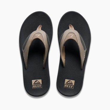 Top view of Fanning men's black and fossil brown sandals with extra cushioning and arch support for beach comfort.