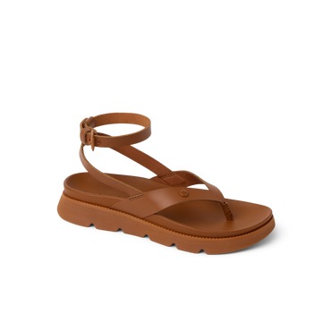 Vista Luxe Sierra women's brown leather sandal facing left, ankle strap, soft-rebound cushioning, beach-inspired comfort.