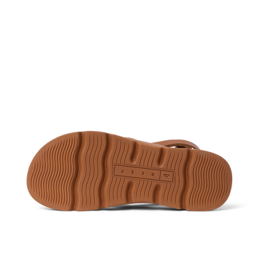 Bottom view of the right Vista Luxe Sierra sandal in brown leather showing textured sole for durable beach comfort