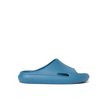 Kids Rio Slide in navy facing right, close-up side view, showcasing water-friendly, cushioned beach footwear for kids.
