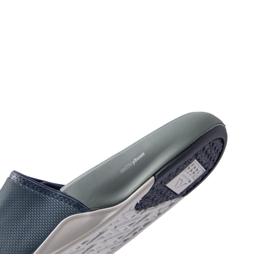 Phantom Slab men's footwear showing right side close-up of cushioned arch support and water-friendly sole design