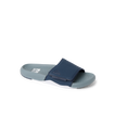Phantom Slab slide facing left showing navy upper strap and gray molded footbed with arch support, surf-inspired comfort footwear.