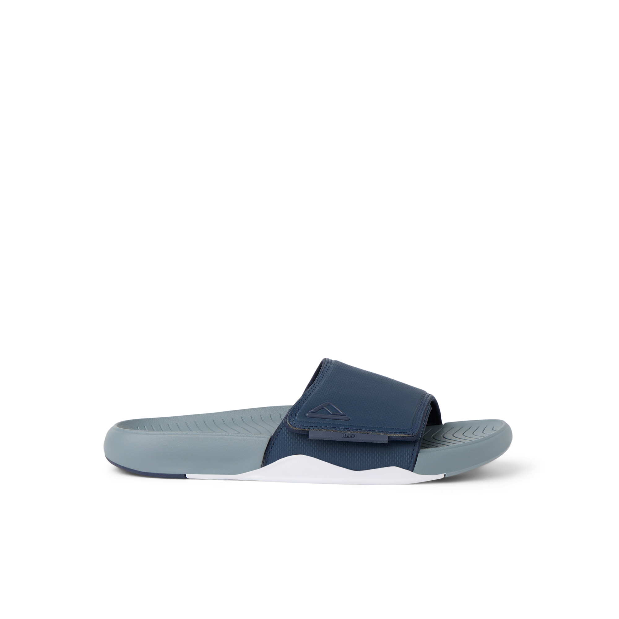 Phantom Slab men's slide sandal facing right, beach-inspired with arch support and soft-rebound cushioning for comfort.