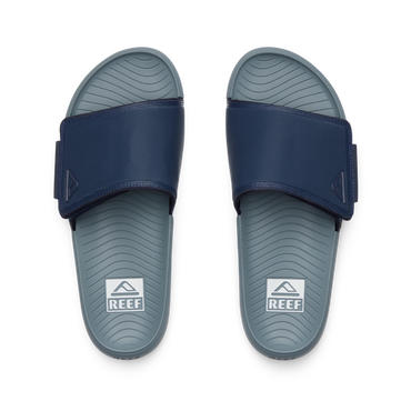 Top-down view of Phantom Slab men's slides in navy and grey, featuring comfort cushioning and anatomical arch support.