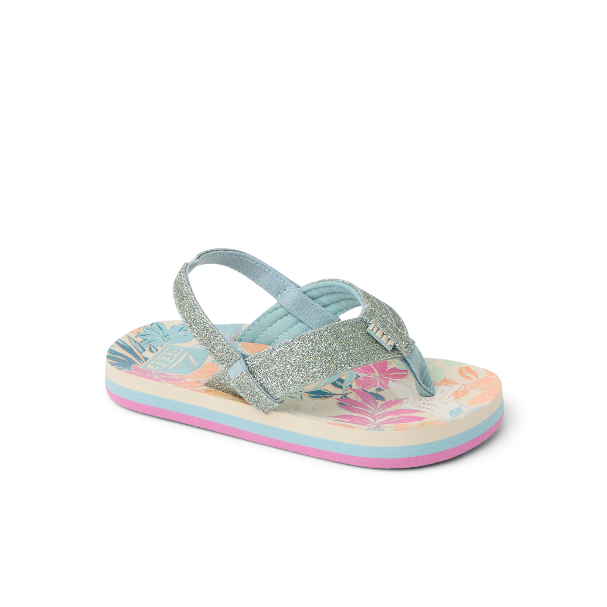 Little Ahi girls' sandal facing left, showing tropical floral footbed and glittery straps with arch support.