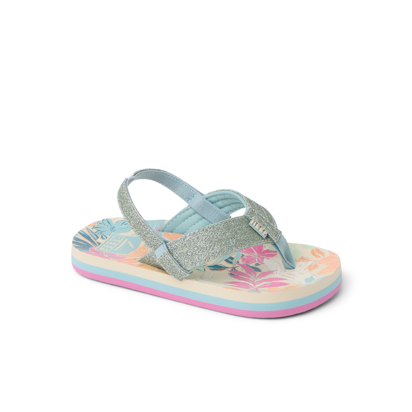 Little Ahi girls' sandal facing left, showing tropical floral footbed and glittery straps with arch support.