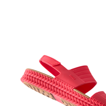 Reef Water Vista women's red platform sandal facing left, showcasing cushioned sole and adjustable strap for comfort.