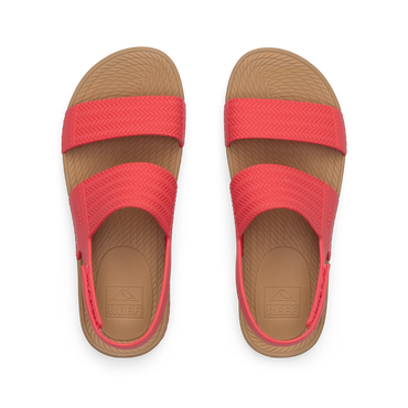 Top view of women's Reef Water Vista coral sandals with arch support and cushioned footbeds, designed for beach comfort.