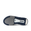 Fanning + men's shoe showing sole with durable, water-friendly materials and anatomical arch support, facing upward.