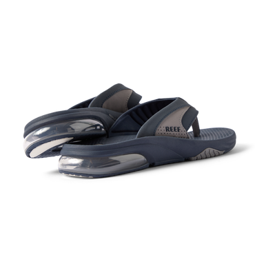 Pair of men's Fanning + sandals facing left showing back and sole with cushioned heel and water-friendly materials