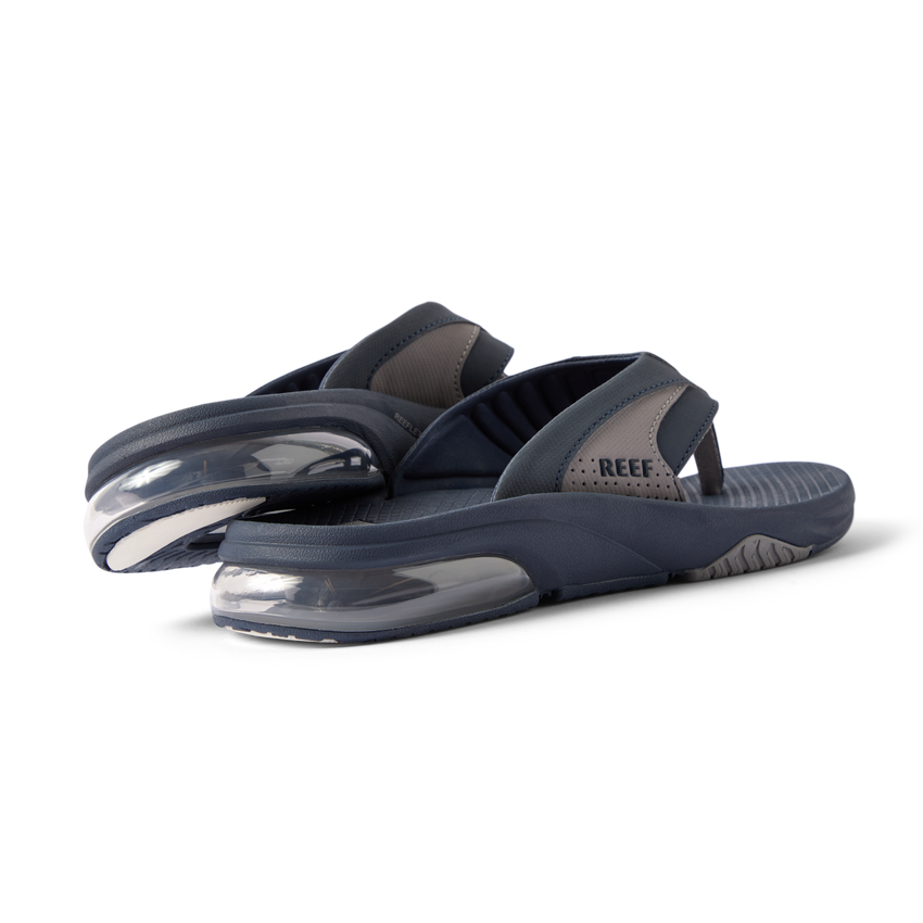 Pair of men's Fanning + sandals facing left showing back and sole with cushioned heel and water-friendly materials