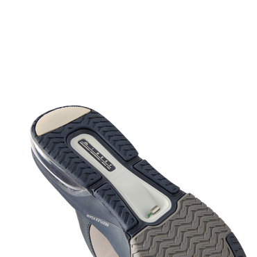 Fanning + men's shoe sole view facing up showing durable, water-friendly REEF design with arch support and cushioning