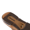 Fanning + men's shoe sole facing up, showing durable tread and comfort-focused cushioning with arch support features.