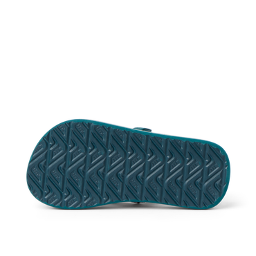 Little Ahi boys sandal showing the bottom sole with durable, water-friendly tread pattern facing up.