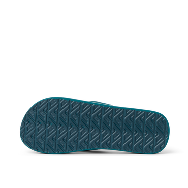Kids Ahi shoe sole facing up showing durable, textured tread designed for comfort and beach use, kids boys footwear by REEF.