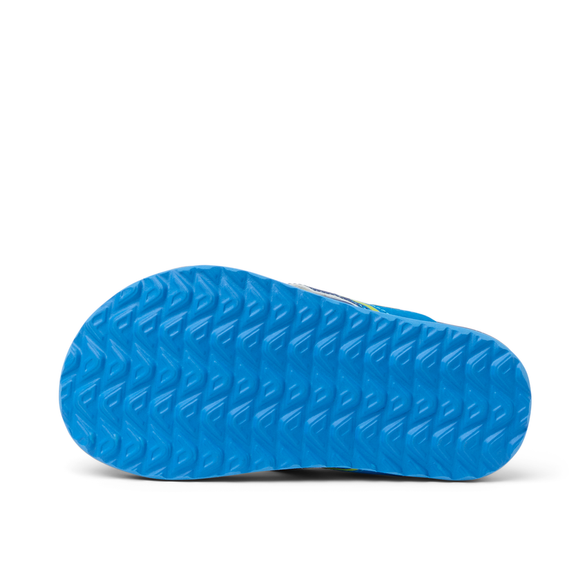 Little Windswell showing the blue textured sole of a boys' flip flop, surf-inspired comfort and durability design.
