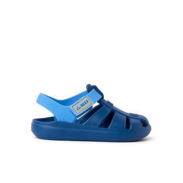 Little Totally Beachin boys sandal facing right, blue with adjustable strap, soft cushioning, and arch support.