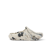 A single Croc-style clog shoe in a marbled cream, beige, black, and gray colorway, shown from a side profile on a clean white background.
