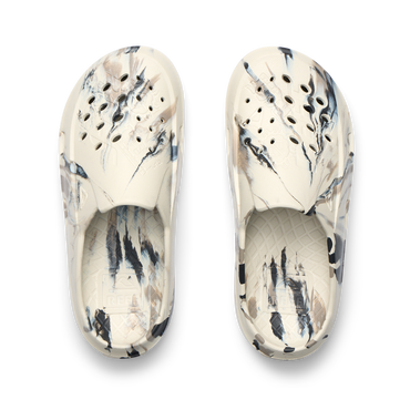 Top-down view of Glider shoes with black and beige marbled pattern, water-friendly and comfort-focused for beach and everyday use.
