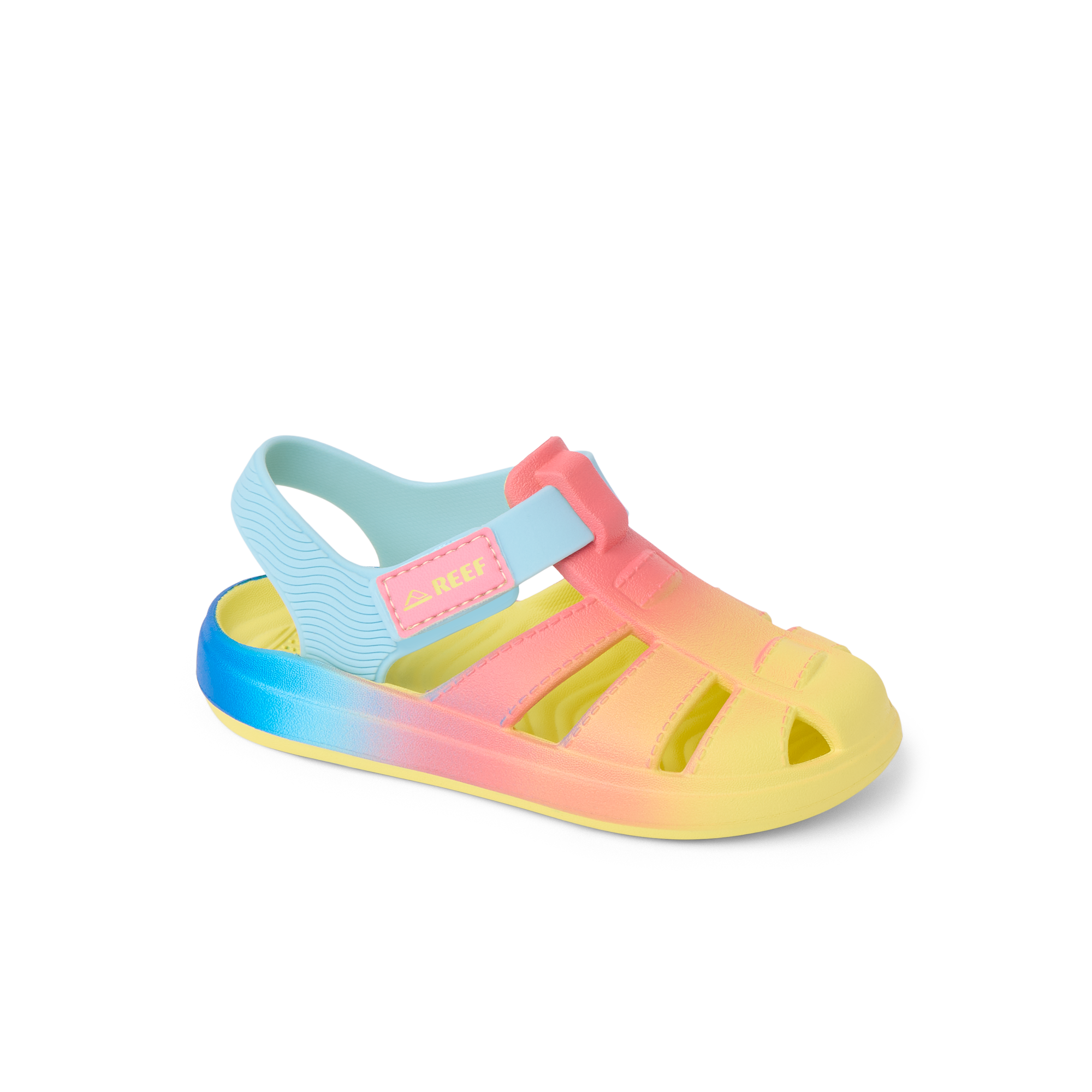 Little Totally Beachin sandal for girls facing left, close-up of front and side with soft cushioning and arch support.