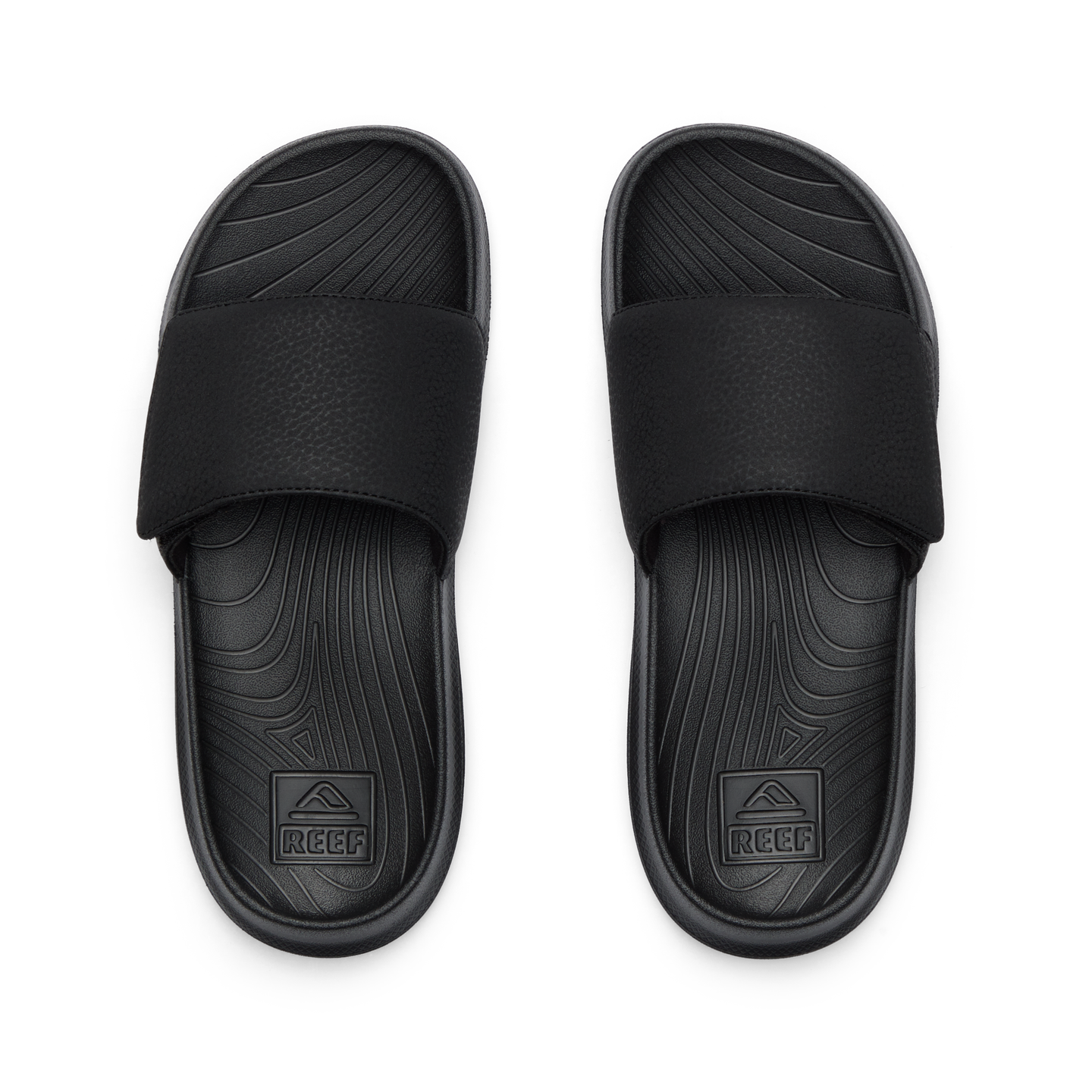 Kids Salty Slide top view showing black water-friendly slides with anatomical arch support and soft cushioning for boys.