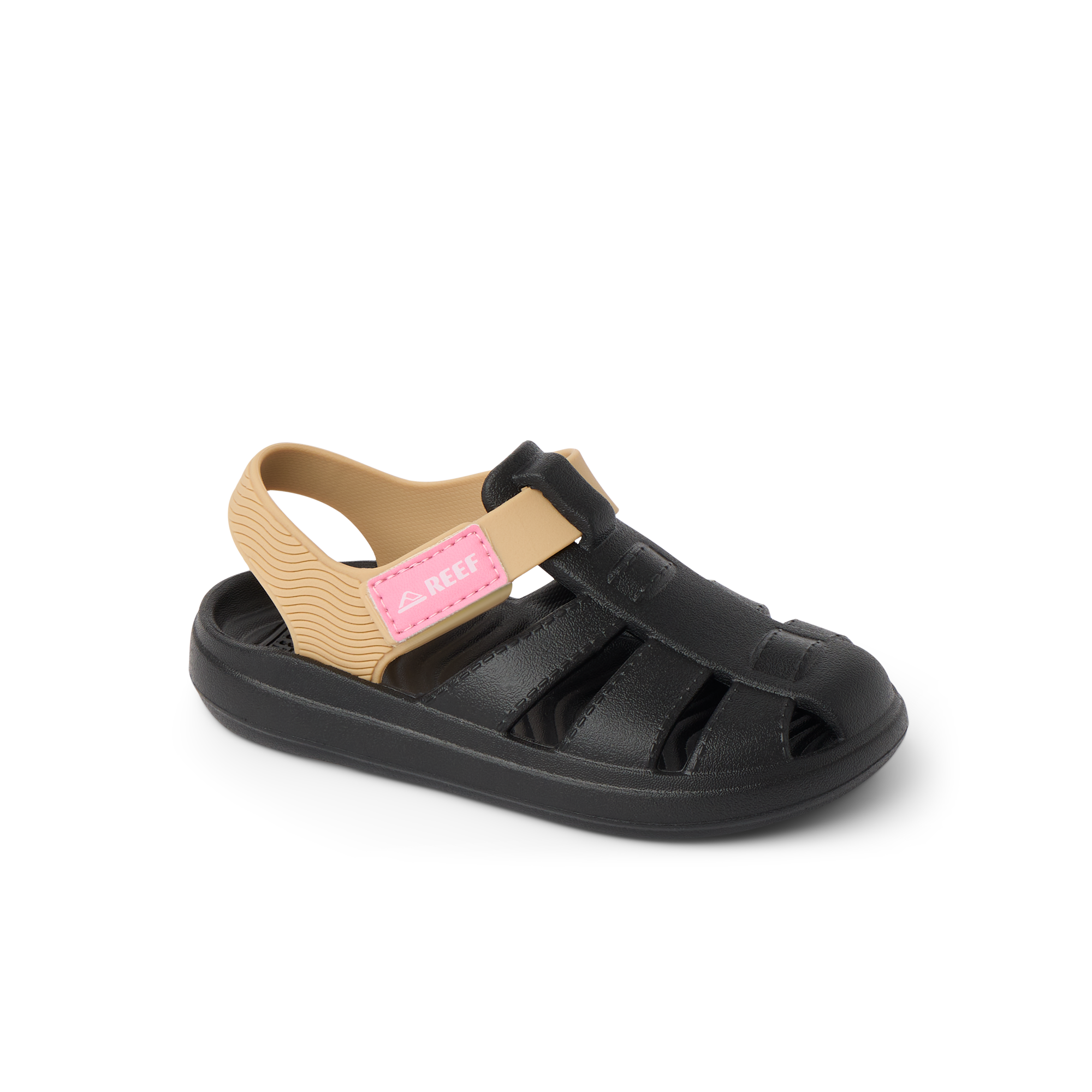 Little Totally Beachin girls sandal facing left, black and tan with arch support and soft cushioning for beach comfort.