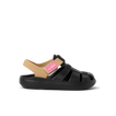Little Totally Beachin black and tan girls’ sandal facing right, featuring soft cushioning and anatomical arch support.