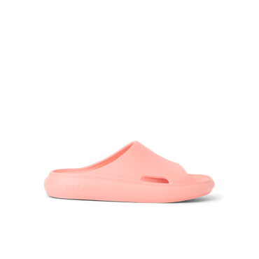 Kids Rio Slide coral-colored unisex slide facing right showing side profile with soft-rebound cushioning and arch support