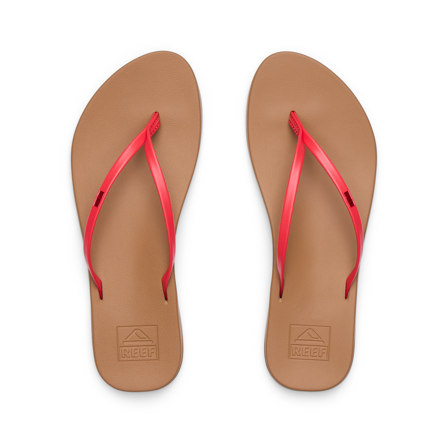Pair of Cushion Slim women's flip-flops facing up showing tan footbed with red straps, water-friendly and comfort-focused design.