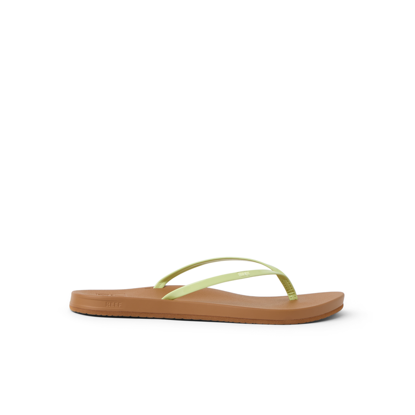 Cushion Slim women's flip flop facing right with lime sherbert straps and cushioned arch support for beach comfort