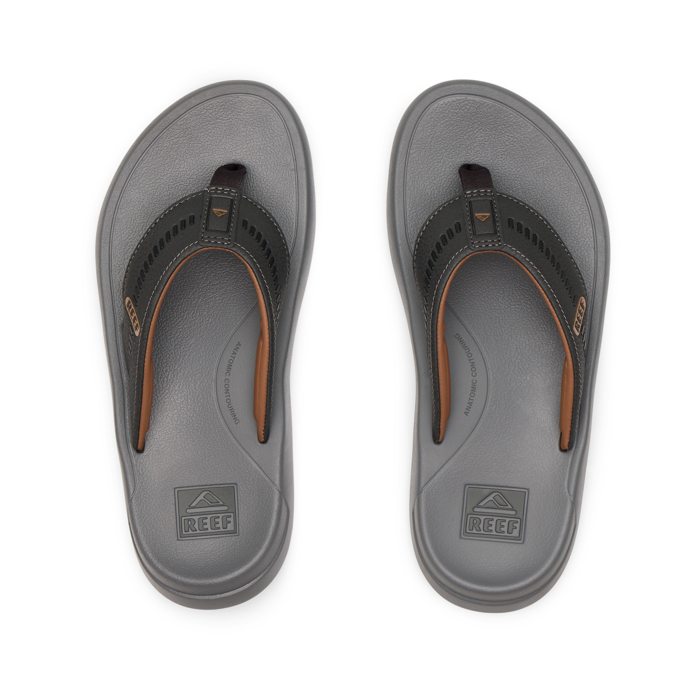 Top-down view of men's Cruiser flip flops in raven gray and brown, featuring anatomical arch support and soft cushioning.