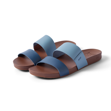Pair of Cushion Vista sandals facing right, showing front and side straps in navy and light blue, lightweight and cushioned.